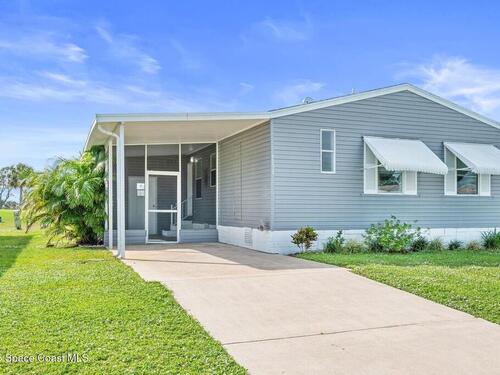 1039 Royal Palm Drive, Barefoot Bay, FL 32976