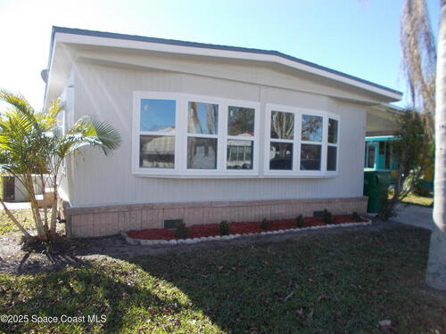 619 Sea Gull Drive W, Barefoot Bay, FL 32976