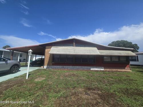 623 Marlin Circle, Barefoot Bay, FL 32976