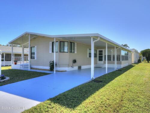 561 Dolphin Circle, Barefoot Bay, FL 32976