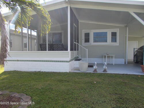 1142 Wren Circle W, Barefoot Bay, FL 32976