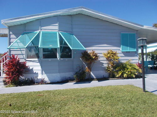 836 Hyacinth Circle E, Barefoot Bay, FL 32976