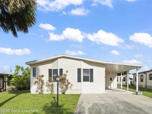 720 Periwinkle Circle, Barefoot Bay, FL 32976