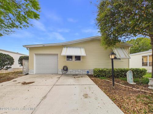 1203 Calusa Drive, Barefoot Bay, FL 32976