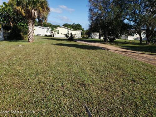 414 Plover Drive, Barefoot Bay, FL 32976