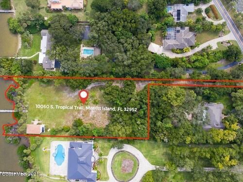 10060* S Tropical Trail, Merritt Island, FL 32952