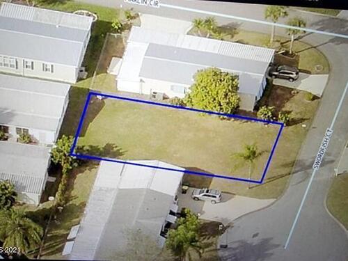 203 Swordfish Court, Barefoot Bay, FL 32976