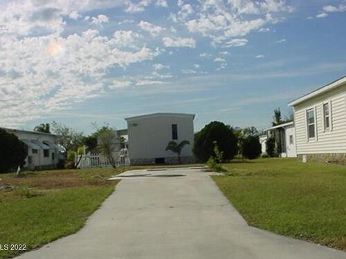 1025 Oriole Circle, Barefoot Bay, FL 32976