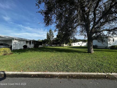 818 Sapodilla Drive, Barefoot Bay, FL 32976